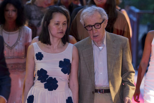U.S. director Woody Allen arrives with his wife Soon Yi Previn at the premiere of his film Blue Jasmine in Paris